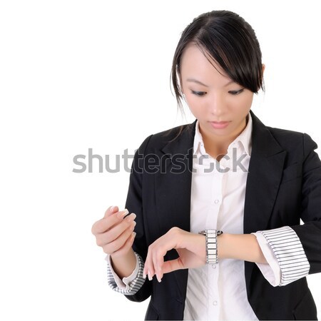 Business woman check time Stock photo © elwynn