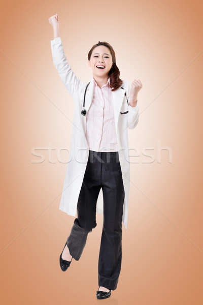 Cheerful Asian doctor Stock photo © elwynn
