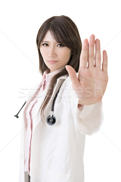 Asian doctor give you reject gesture Stock photo © elwynn