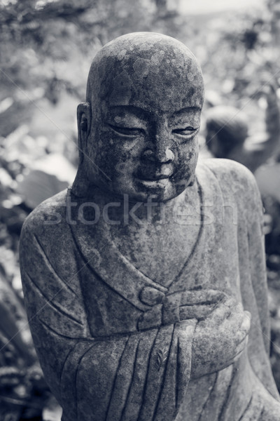 Ruined statue Ksitigarbha Bodhisattva  Stock photo © elwynn