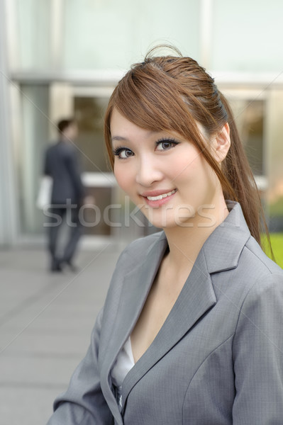 Jovem negócio gerente mulher asiático sorridente Foto stock © elwynn
