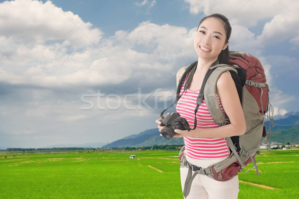 backpacker with camera Stock photo © elwynn