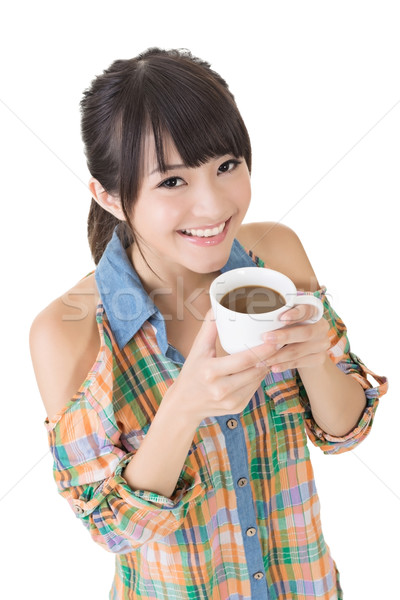 Asian woman with cup of coffee or tea. Stock photo © elwynn