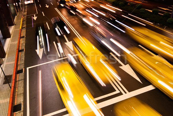 Városkép autók mozgás elmosódott fény éjszaka Stock fotó © elwynn