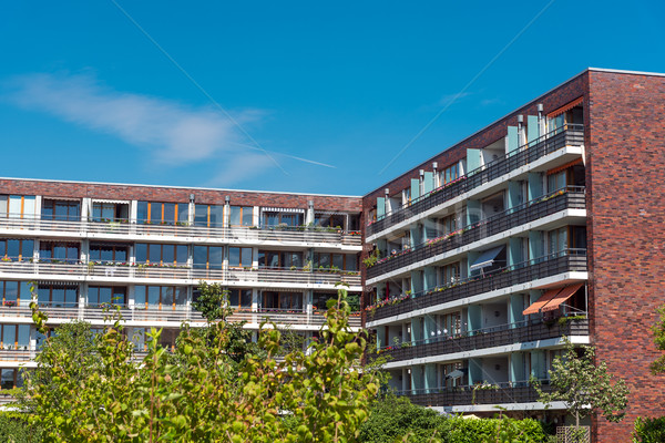 Apartment houses with red bricks Stock photo © elxeneize