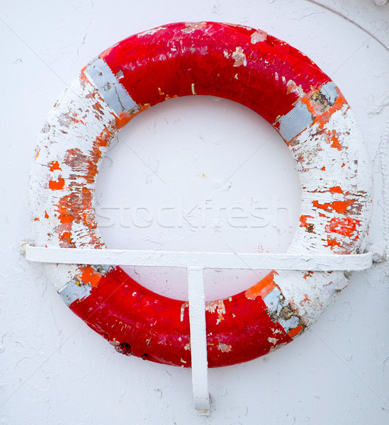 Old lifesaver on board of a ship Stock photo © elxeneize
