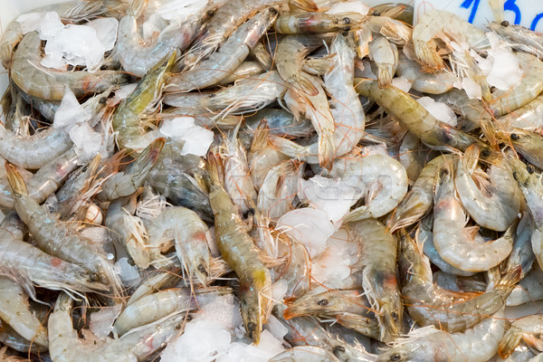 Fresh shrimps at a market Stock photo © elxeneize