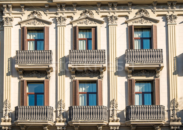 Facade with balconies in Barcelona Stock photo © elxeneize