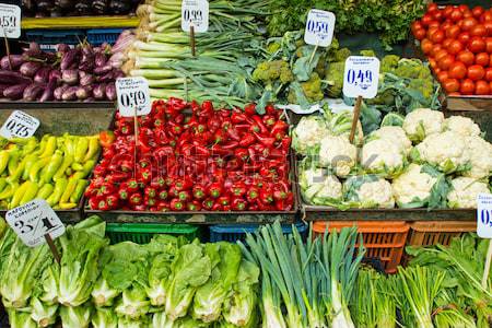 Salad and vegetables on a market Stock photo © elxeneize