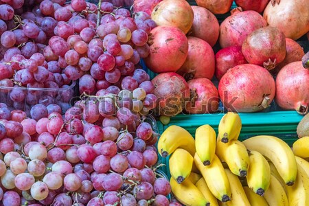 Stock photo: Pomegranates, bananas and grapes