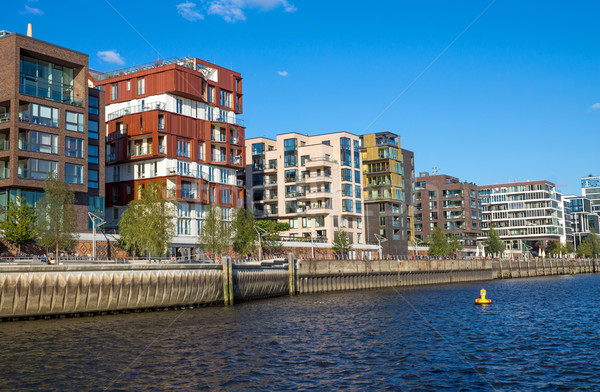 Hamburg nieuwe appartement huizen water gebouw Stockfoto © elxeneize