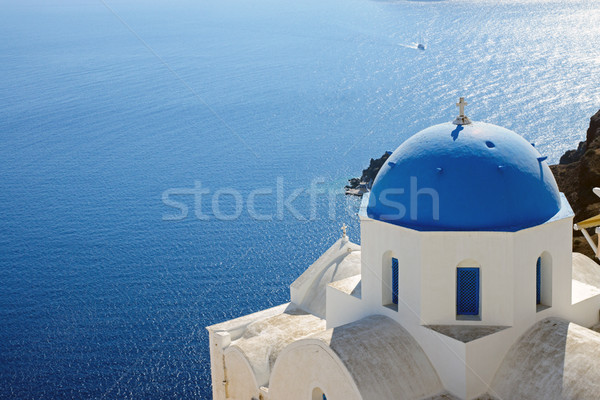 Church with blue cupola in Oia Stock photo © elxeneize