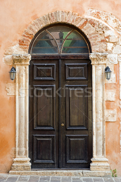 Church door in Chania Stock photo © elxeneize