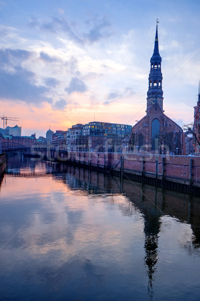 Church in Hamburg after sunset Stock photo © elxeneize