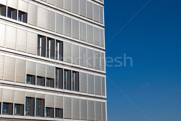 Office building with many shutters Stock photo © elxeneize