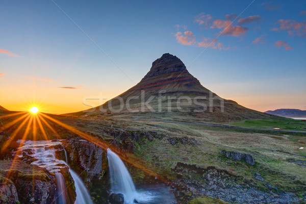 Pôr do sol Islândia céu água grama sol Foto stock © elxeneize