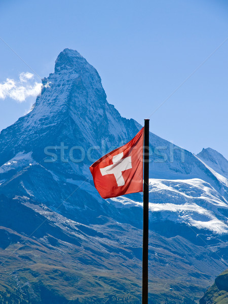 Swiss flag with the Matterhorn Stock photo © elxeneize