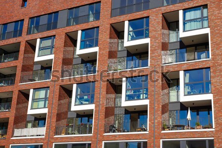 Facade with a lot of balconies Stock photo © elxeneize