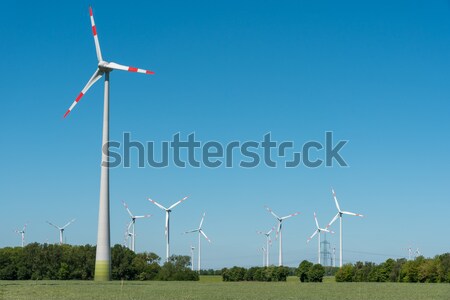 Wind energy plants on a sunny day  Stock photo © elxeneize