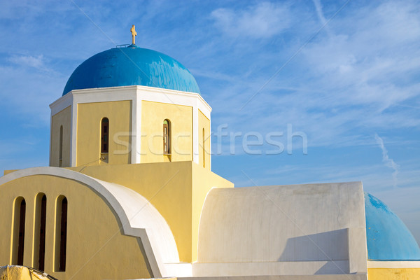 Yellow church with blue cupola Stock photo © elxeneize