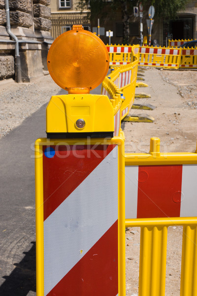 Construction site with lining poles Stock photo © elxeneize