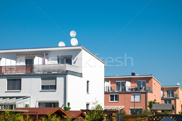 Modern residential houses Stock photo © elxeneize