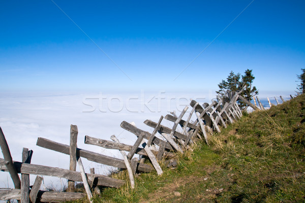Ahşap çit alpler üzerinde bulutlar gökyüzü Stok fotoğraf © elxeneize