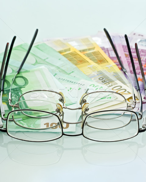 Lunettes devises argent fond verres euros [[stock_photo]] © emese73