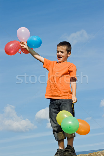 Garçon ballons permanent pierre [[stock_photo]] © emese73