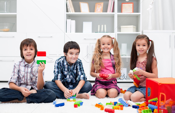 Enfants jouer blocs heureux visage construction [[stock_photo]] © emese73