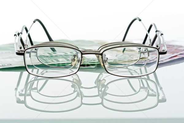 Lunettes devises réflexion surface argent fond [[stock_photo]] © emese73