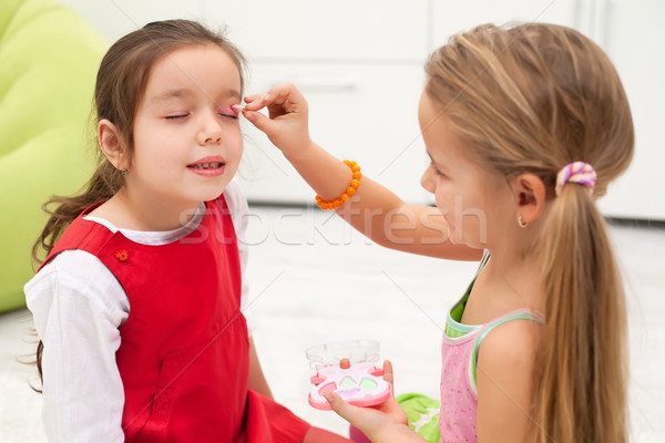 Composent petite fille maquillage visage rouge [[stock_photo]] © emese73