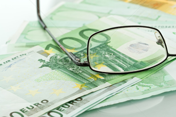 Lunettes devises argent fond verres euros [[stock_photo]] © emese73