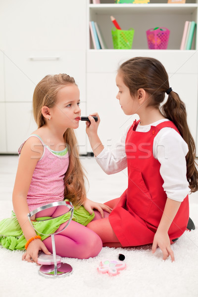 Rouge à lèvres petite fille bouche oeil [[stock_photo]] © emese73