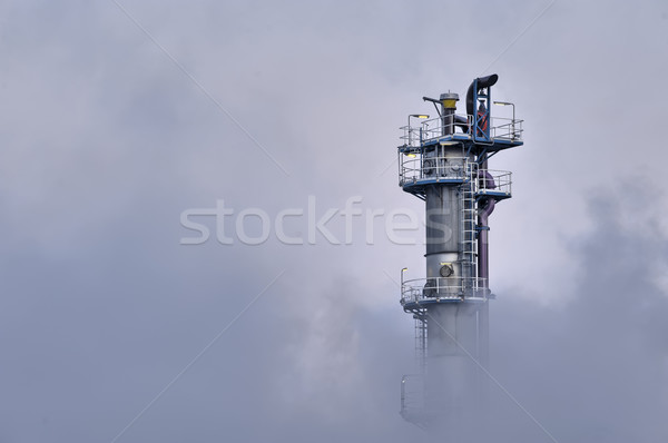Industrial torre cubierto nubes vapor Foto stock © emiddelkoop