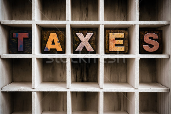 Taxes Concept Wooden Letterpress Type in Drawer Stock photo © enterlinedesign