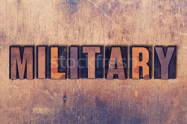 Military Theme Letterpress Word on Wood Background Stock photo © enterlinedesign
