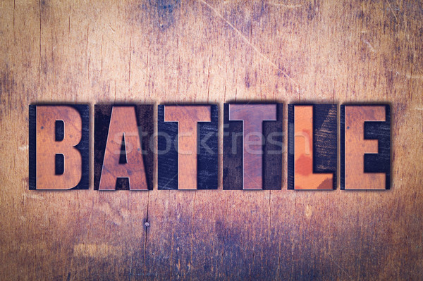 Battle Theme Letterpress Word on Wood Background Stock photo © enterlinedesign