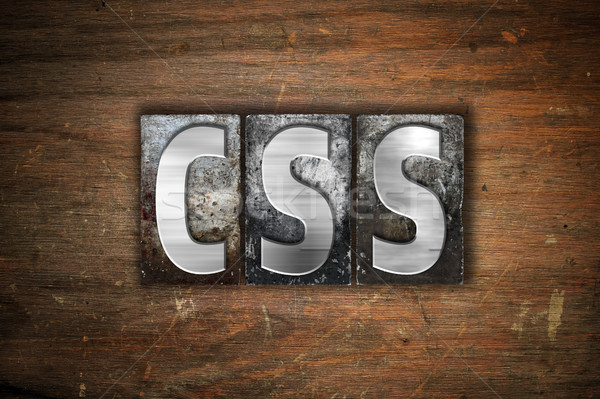 CSS Concept Metal Letterpress Type Stock photo © enterlinedesign