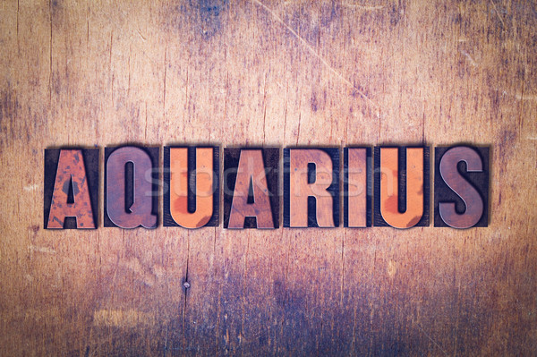 Aquarius Theme Letterpress Word on Wood Background Stock photo © enterlinedesign