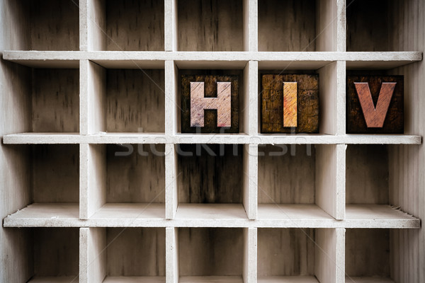 HIV Concept Wooden Letterpress Type in Draw Stock photo © enterlinedesign