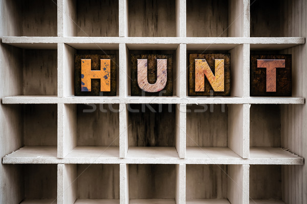 Hunt Concept Wooden Letterpress Type in Draw Stock photo © enterlinedesign