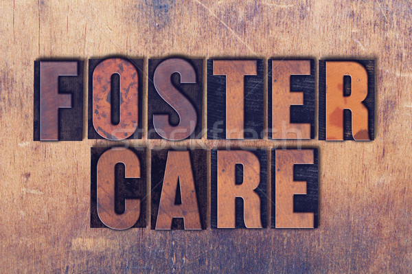 Foster Care Theme Letterpress Word on Wood Background Stock photo © enterlinedesign