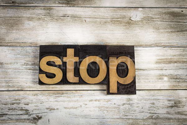 Stop Letterpress Word on Wooden Background Stock photo © enterlinedesign