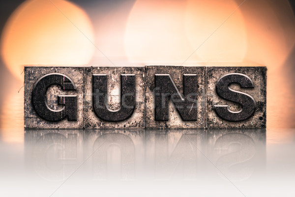 Fegyverek klasszikus magasnyomás szó írott Stock fotó © enterlinedesign