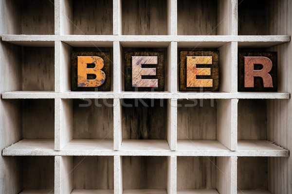 Beer Concept Wooden Letterpress Type in Draw Stock photo © enterlinedesign