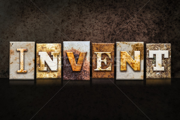 Invent Letterpress Concept on Dark Background Stock photo © enterlinedesign