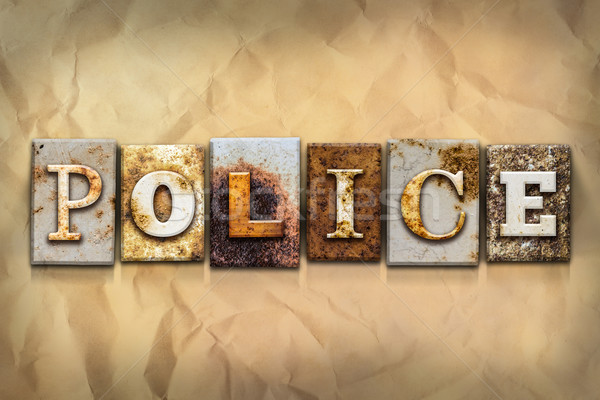 Police Concept Rusted Metal Type Stock photo © enterlinedesign