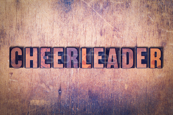 Cheerleader Theme Letterpress Word on Wood Background Stock photo © enterlinedesign