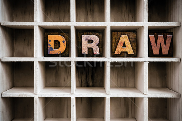 Draw Concept Wooden Letterpress Type in Draw Stock photo © enterlinedesign